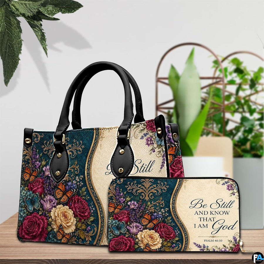 Detailed perspective of teal damask pattern with golden scrollwork and monarch butterflies on handbag.