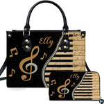 Front studio presentation displaying golden treble clef piano artwork alongside companion accessory on white surface.