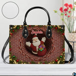 Interior compartment view of holiday chimney handbag displaying inner lining and open storage space.