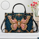 Front tabletop presentation of baroque teal butterfly artwork placed beside floral vase and circular texture inset.