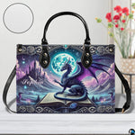 Dragon art handbag on table with circular texture swatch showing fine surface finish.
