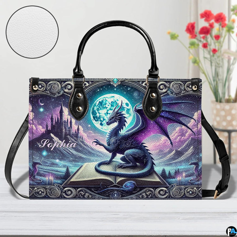 Dragon art handbag on table with circular texture swatch showing fine surface finish.