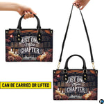 Carrying demonstrations displaying dual top handle grip and shoulder strap suspension.