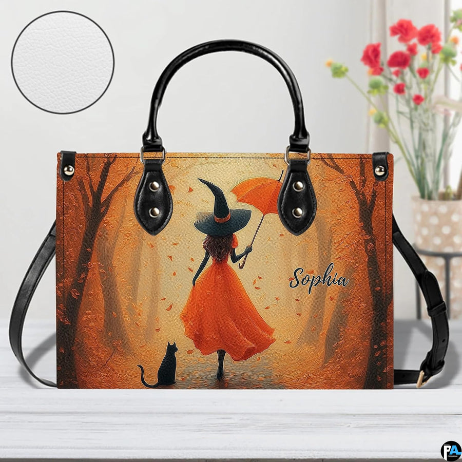 Autumn witch illustration on tabletop with floral accents and circular surface view.