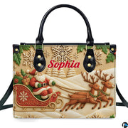 Front view of holiday handbag featuring carved bas-relief artwork of Santa in sleigh with reindeer