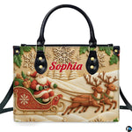 Front view of holiday handbag featuring carved bas-relief artwork of Santa in sleigh with reindeer