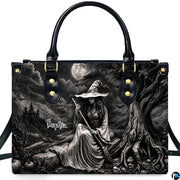 Lifestyle presentation highlighting the high-contrast monochrome gothic sorceress and full moon design.