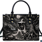 Lifestyle presentation highlighting the high-contrast monochrome gothic sorceress and full moon design.