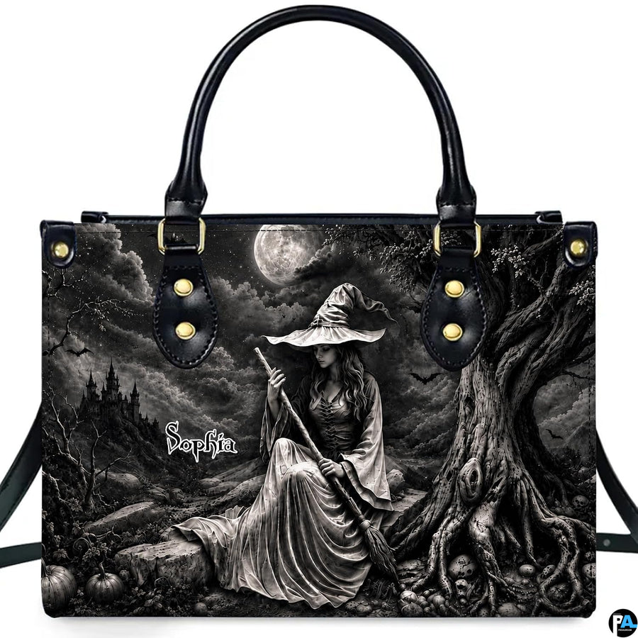 Lifestyle presentation highlighting the high-contrast monochrome gothic sorceress and full moon design.