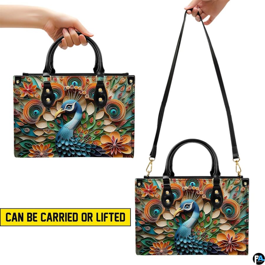 Blue peacock handbag shown in top-handle and shoulder carry styles