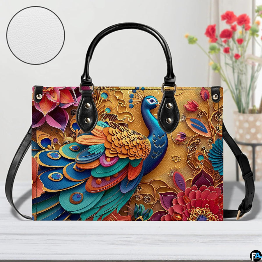 Blue peacock floral handbag with long black carrying strap