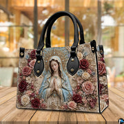 Baroque crowned Virgin Mary handbag resting on wooden table in sunlit indoor space