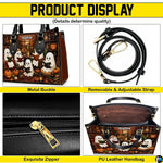 Product display overview showing metal hardware, adjustable shoulder strap, zipper top, and interior.