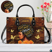 Frontal studio view of gold rose art accessory beside circular inset highlighting typographic coiffure.