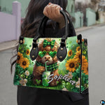 Outdoor street view of festive green Highland cow artwork with sunflowers carried by hand