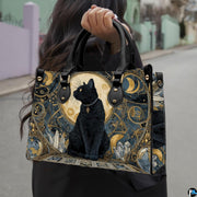 Angled perspective view highlighting the ornate art nouveau feline illustration.