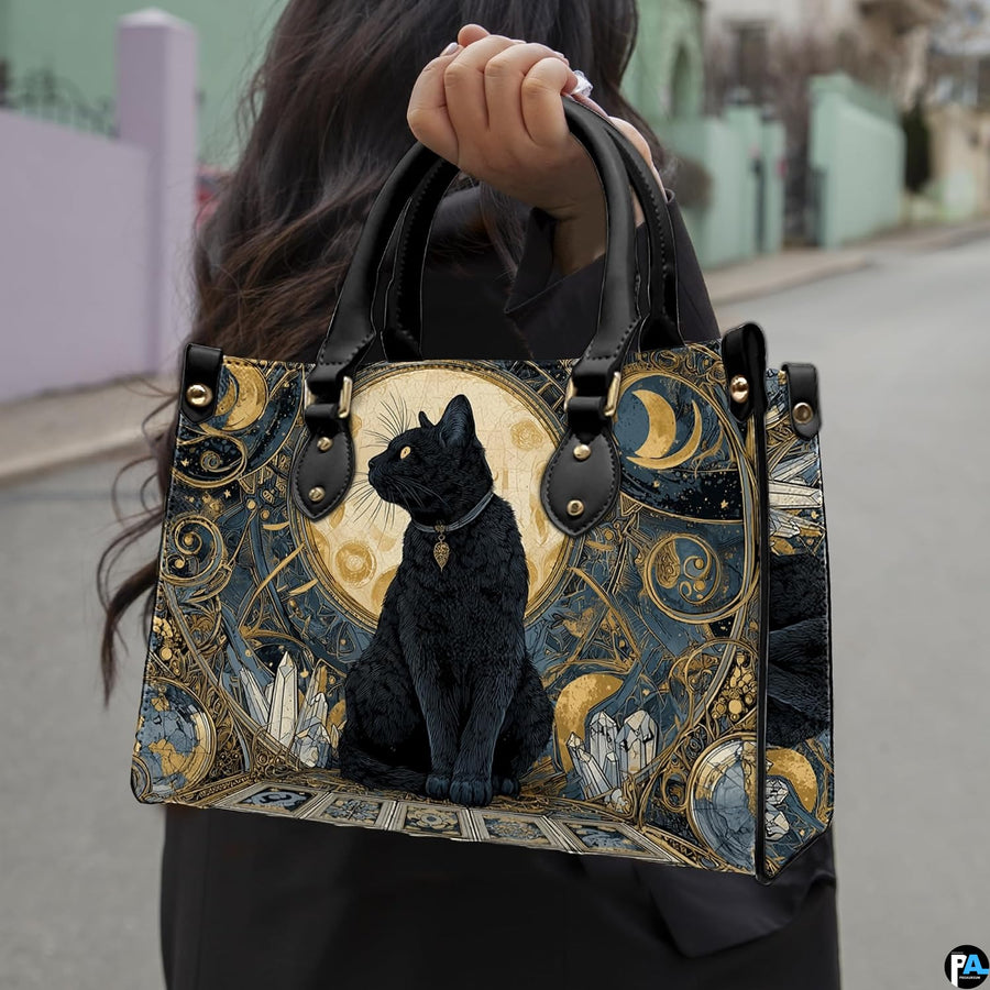 Angled perspective view highlighting the ornate art nouveau feline illustration.