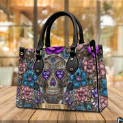 Jeweled skull handbag displayed on wooden plank table before indoor window.