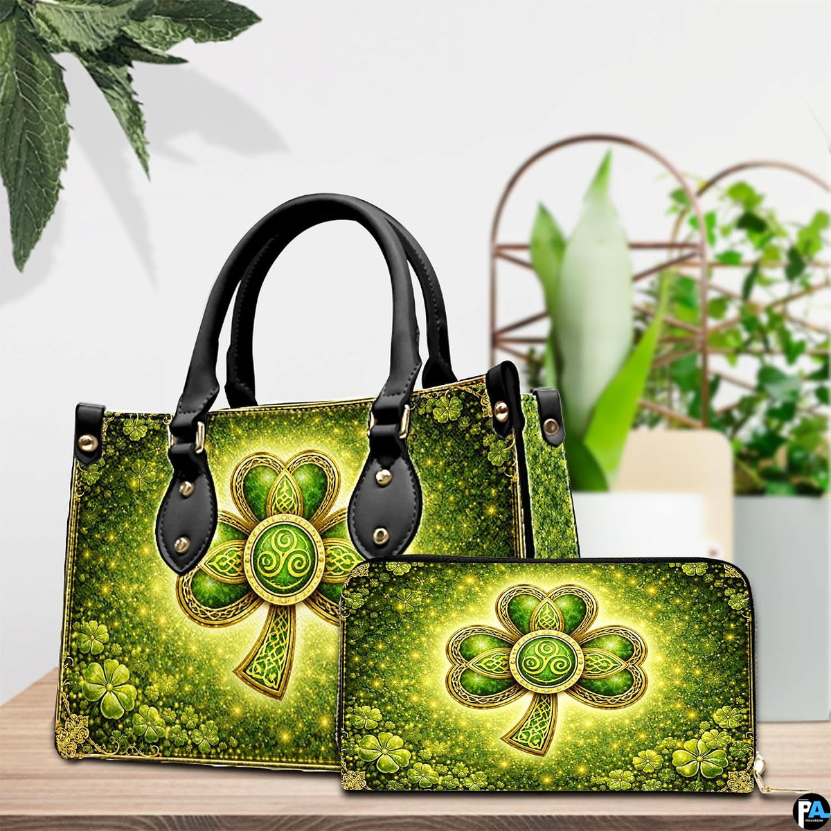 Green clover handbag and matching wallet in a tabletop scene