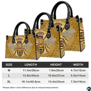 Coordinated handbag and wallet pair highlighting the amber bee artwork.