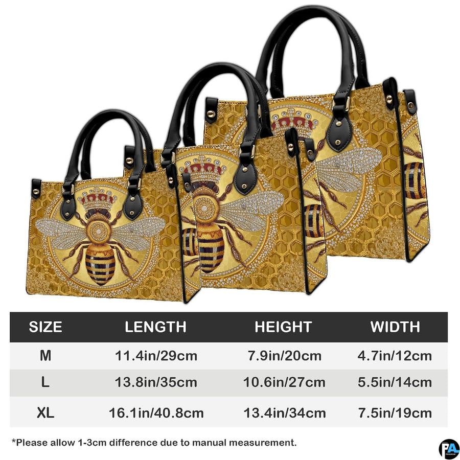 Coordinated handbag and wallet pair highlighting the amber bee artwork.