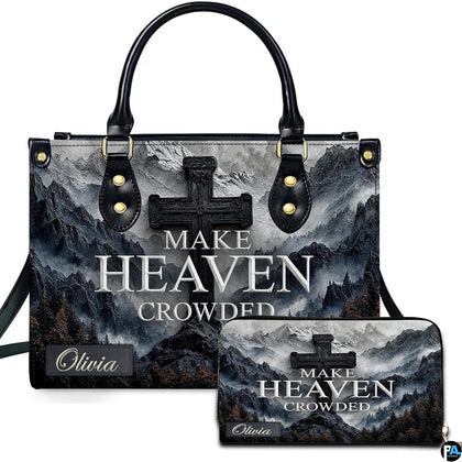 Front view of mountain peak stone cross handbag and matching wallet set with misty alpine scenery
