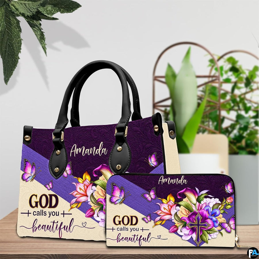 Floral butterfly handbag and wallet displayed on wooden table beside potted plant.