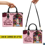 Dual display showing handheld top handle and shoulder strap carrying arrangements.