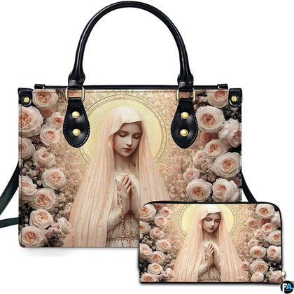 Virgin Mary in blush pink veil praying with rosary amidst peach roses on handbag and matching wallet.