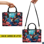 Matching wallet featuring detailed stained glass hummingbird illustration against blue mosaic sky.
