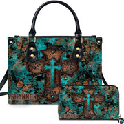 Rustic turquoise cross butterfly handbag and matching wallet set with distressed patina background.