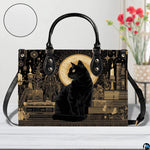 Straight-on studio view of black cat gothic art highlighting detailed golden surface texture.