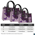 Complete display of purple faith butterfly handbag alongside coordinating printed wallet.