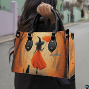 Street perspective view of the autumn witch and black cat accessory in daylight.