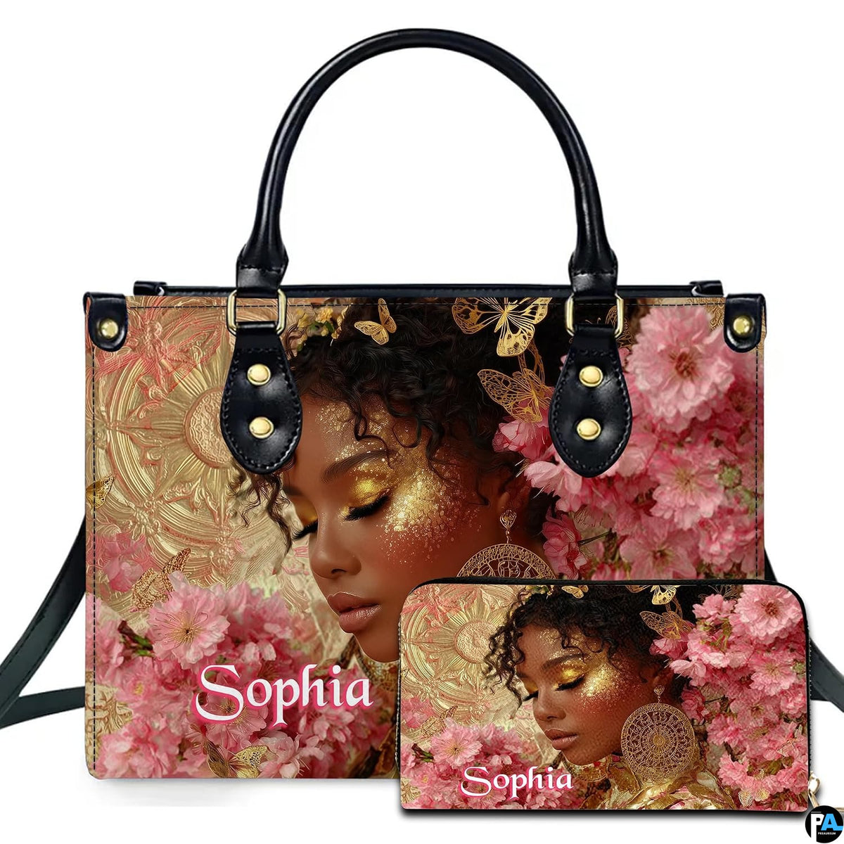 Front view showing golden glow afro portrait accessory paired with matching companion item amid pink blossoms.