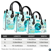 Side perspective view of celestial water bearer handbag and wallet showing structured profile