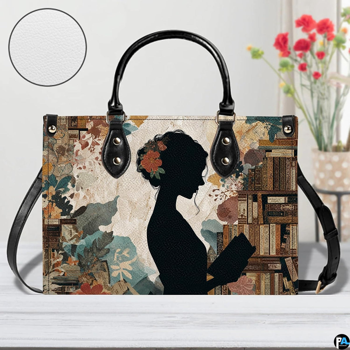 Dual display showing handheld top handle and shoulder strap carrying arrangements.