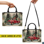 Side profile view of handbag showcasing continuous winter landscape pattern