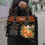 Christian hummingbird floral handbag displayed alone on white background.