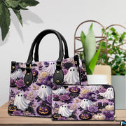 Cute ghost handbag and wallet displayed on wooden table beside potted plant.