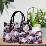 Cute ghost handbag and wallet displayed on wooden table beside potted plant.