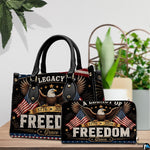 Alternative angle display of patriotic bald eagle handbag and wallet set