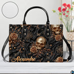 Golden skull handbag on white wooden table beside floral vase with texture swatch inset.