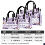 Arrangement of floral handbag and wallet presenting the unified lavender garden theme.