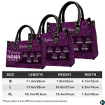 Side view of handbag highlighting dark handle attachments and floral exterior styling.