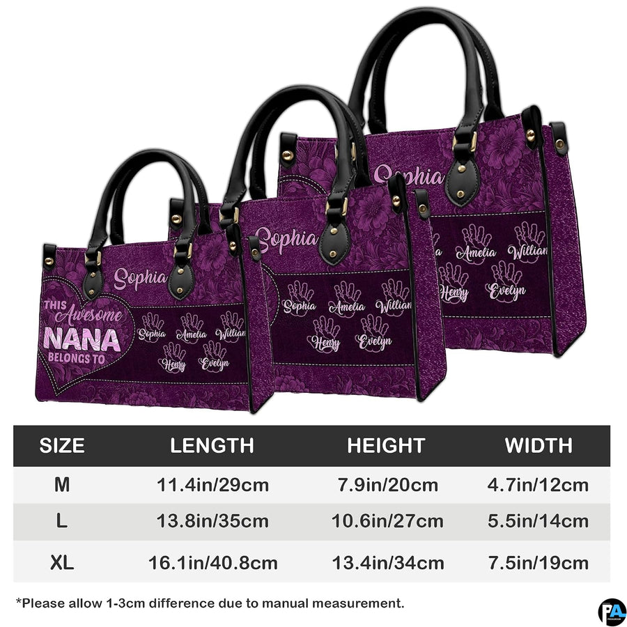 Side view of handbag highlighting dark handle attachments and floral exterior styling.