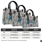 Top-down view displaying interior compartment and black carrying handles of the handbag.