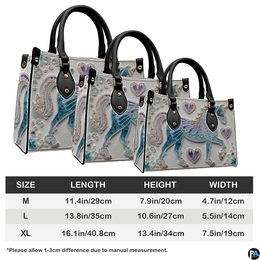 Top-down view displaying interior compartment and black carrying handles of the handbag.