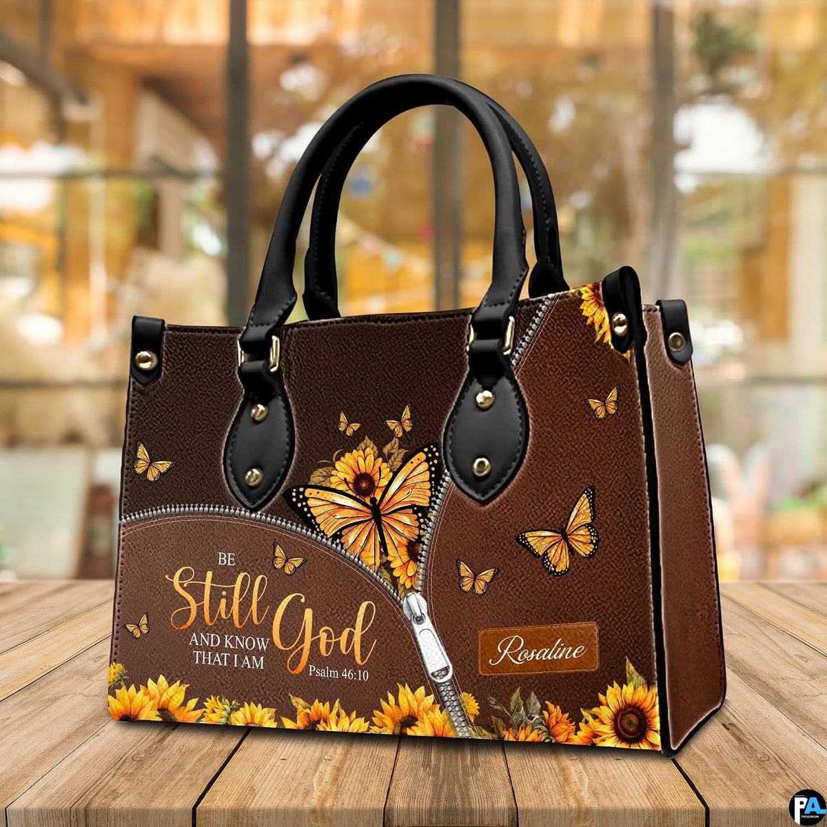 Close-up of golden monarch butterfly featuring detailed sunflower petal wings and trompe l'oeil track.