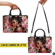 Demonstration displaying handheld lift and hanging options for the pink floral portrait item.